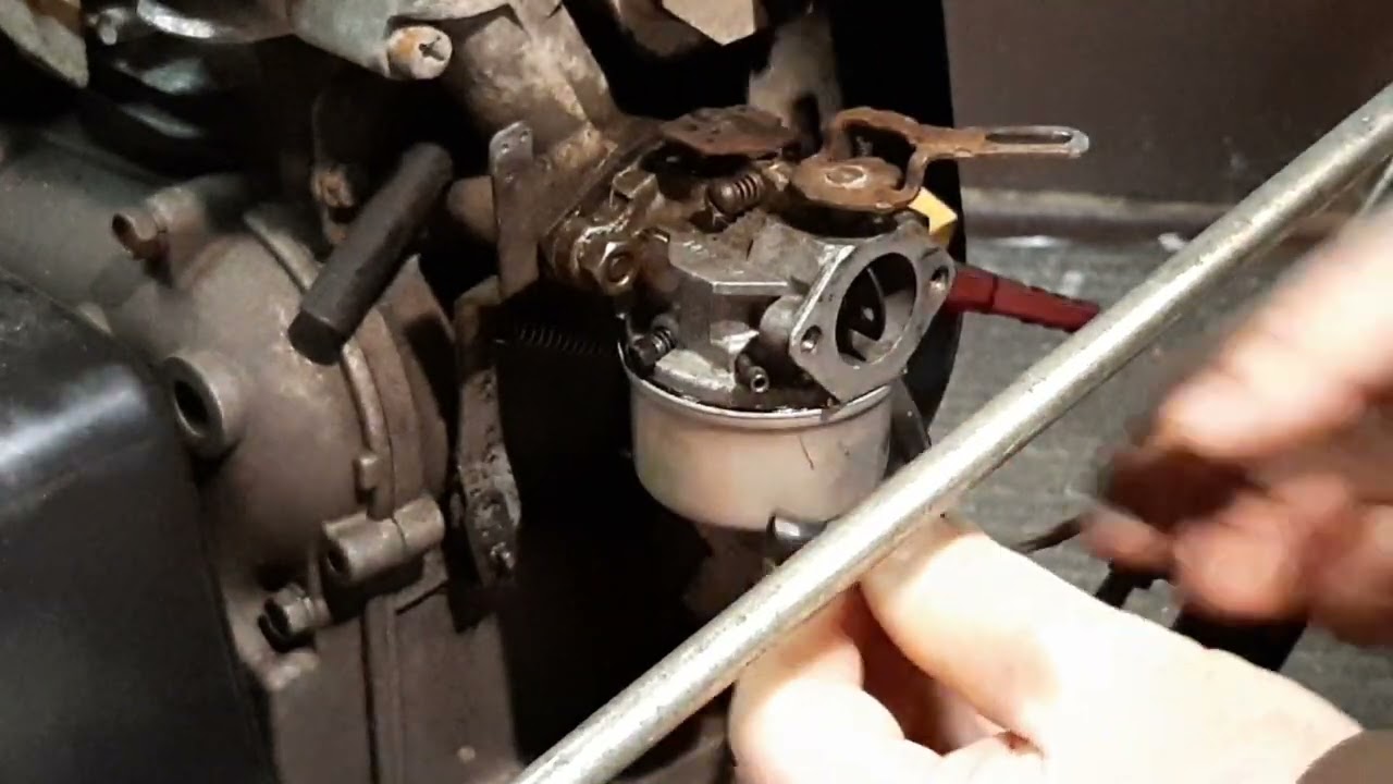 Replacing carburetor on a Toro 521 snowblower.