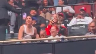 Kendrick Lamar’s fiancée Whitney Alford watching him perform at his pop up concert