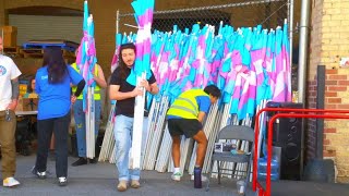 Project Rainbow volunteers distribute more than 1,800 flags ahead of Trans Day of Visibility