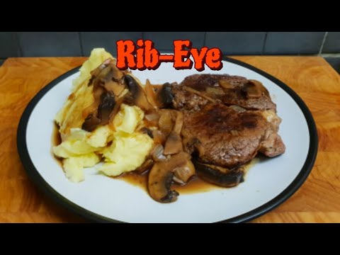 Pan Fried Rib-Eye Steak with Onion and Mushroom Gravy