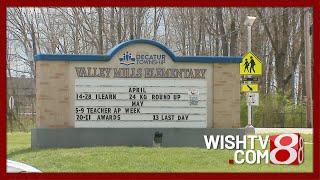 Mother faces charges for bringing gun to school, harassing her child's teacher