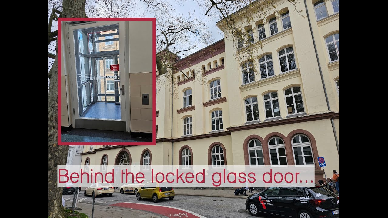 Locked off scenic 2011 M.S. elevator - evening school of Hamburg, Germany