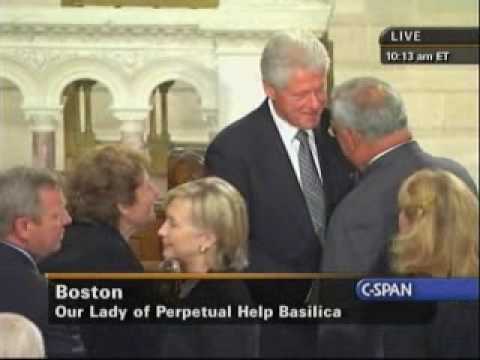 Former President Bill Clinton and current President Barack Obama and their wives arrive at Our Lady of Perpetual Help Basilica in Boston, for a funeral mass for Sen. Edward Kennedy, who is to be eulogized by Obama. Former Presidents Jimmy Carter and George W. Bush - seen speaking with Vice President Joe Biden and his wife, Jill - are also present.