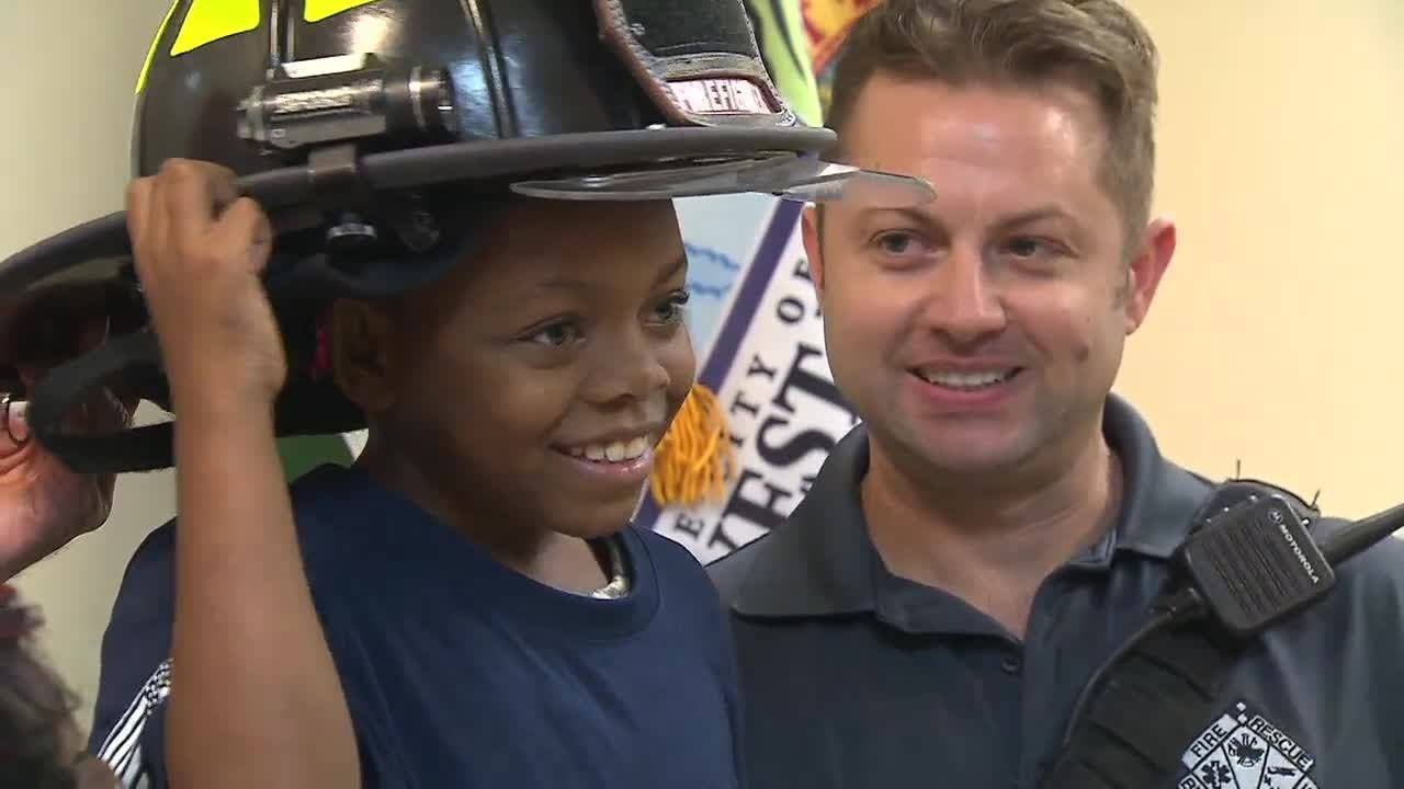 8-year-old girl honored for saving family from house fire - YouTube
