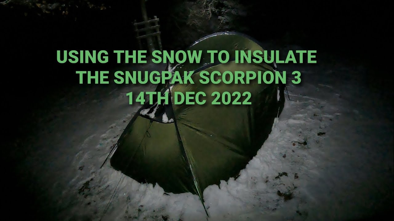 using the snow cleared off the tent to insulate the Snugpak Scorpion 3. 14th Dec 2022