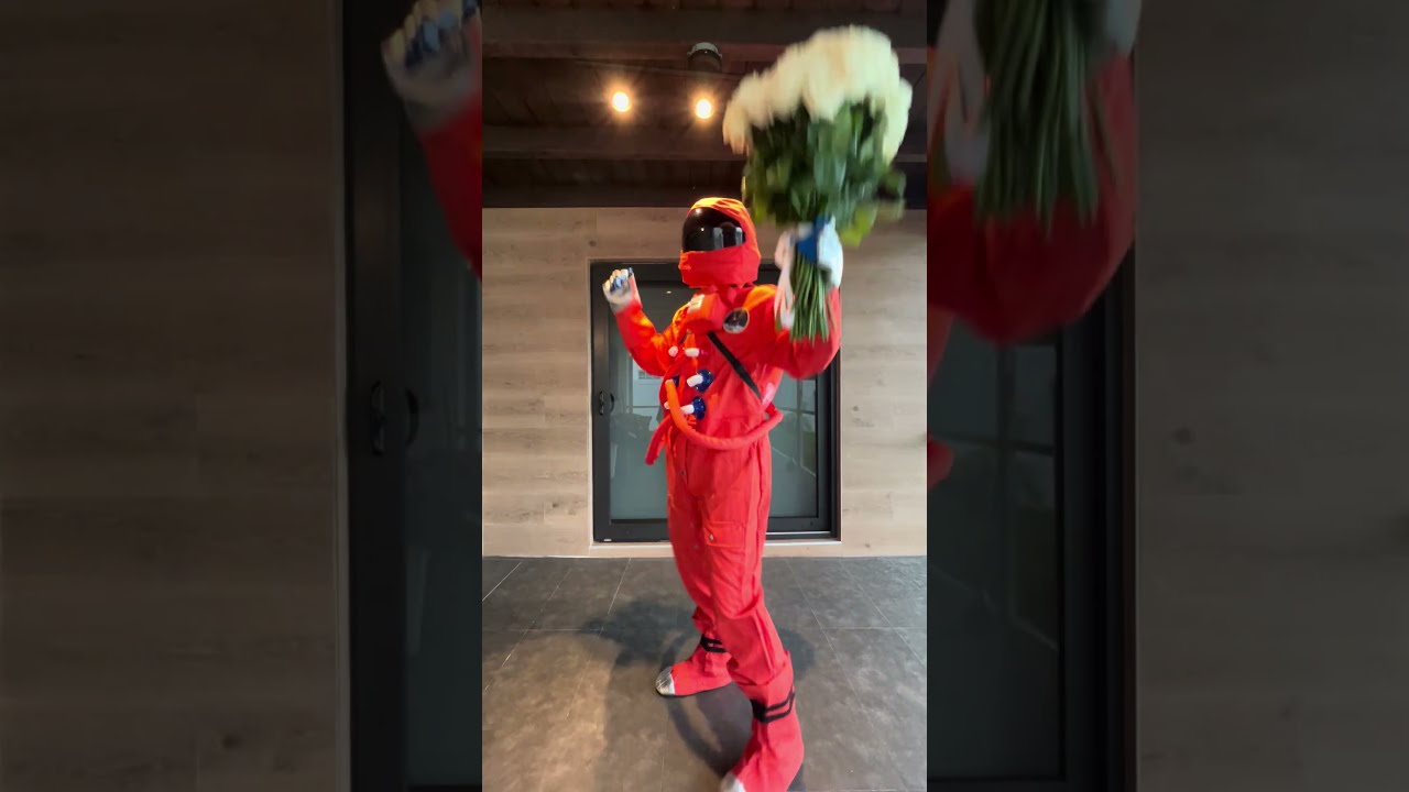 Red Astronaut Delivers White Roses | Elegant Character Flower Delivery Surprise