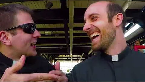 Two Catholic Priests ride the Thunder Bolt at Kenn...