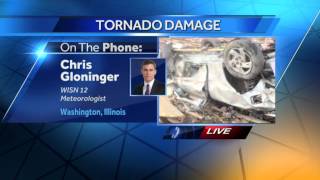 Meteorologis Chris Gloninger surveys tornado damage in Illinois