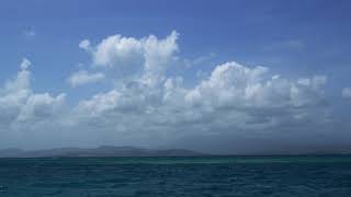 Sea Timelapse With Beautiful Cloud Moving On Waves With Mountains In Background In 4K