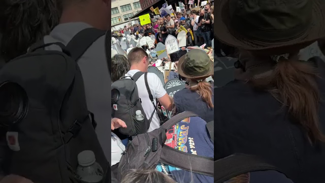 Protesters gather outside Tesla showrooms and dealerships to denounce Elon Musk and DOGE 03.39.2025