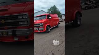 CUSTOM VANS driving off the Show Field of 52nd Van Nationals Vans in Motion Van Lifers Old School