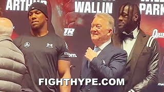 DEONTAY WILDER & ANTHONY JOSHUA COME FACE TO FACE; SHAKE HANDS & EXCHANGE WORDS