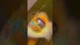 What's that stuck in her bath bomb? 🤨