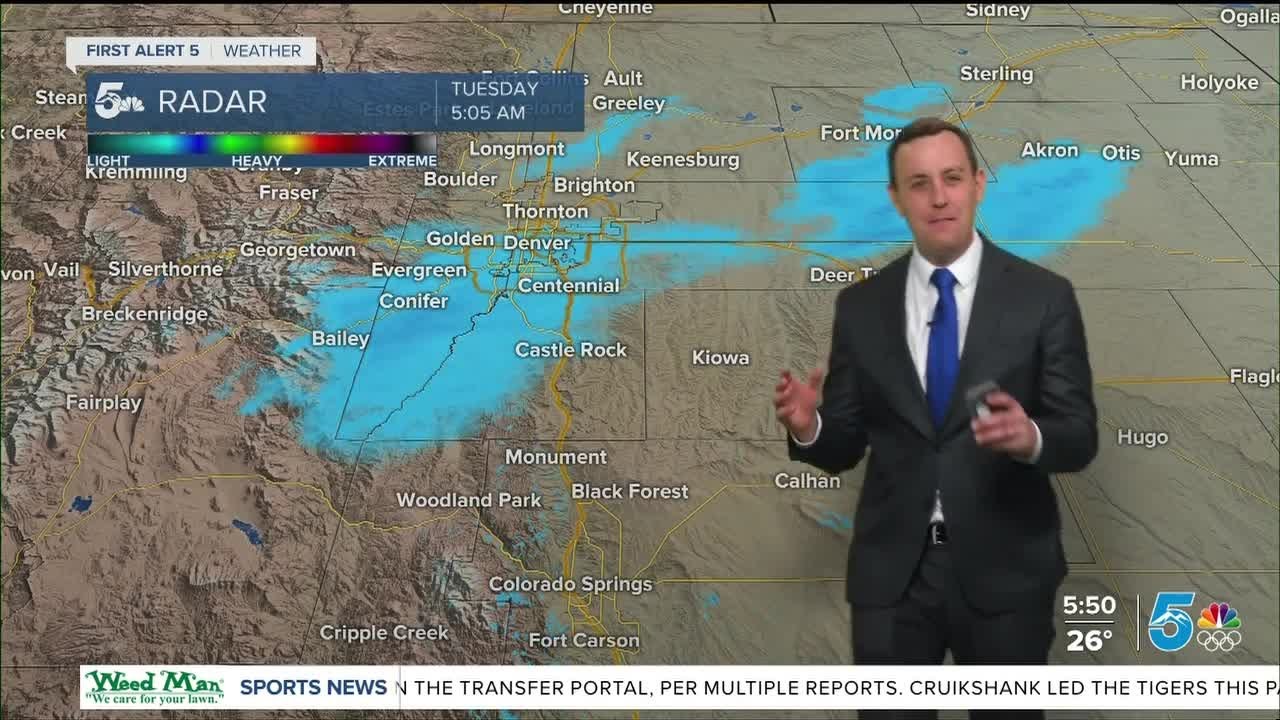 Much colder today with light snow on the Palmer Divide and up to Denver