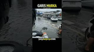 This Man Bumps Into A Road Barrier While Walking Away From A Flood shorts