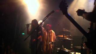 Enslaved offering cheese and wine to Neige from Alcest