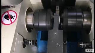 Double-head automatic loading and unloading chamfering machine