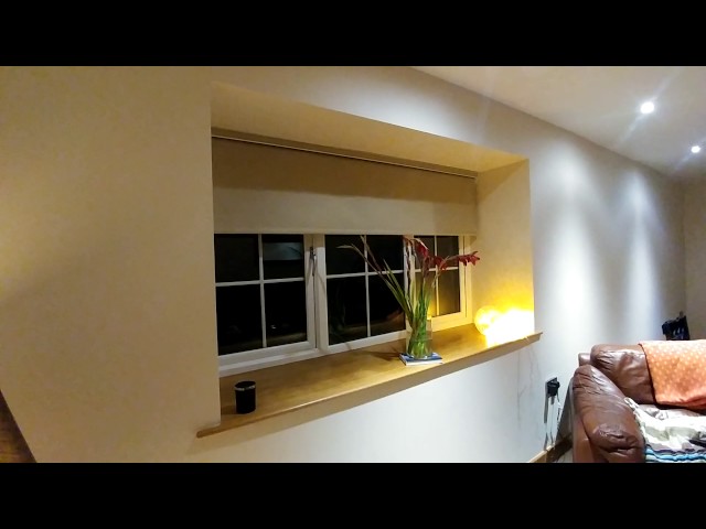 Motorised window blinds for a lounge