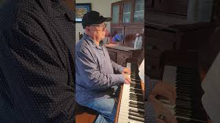 Phil Coulter's, "The Town I Loved So Well"