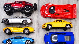Cars of Different Size in Hands