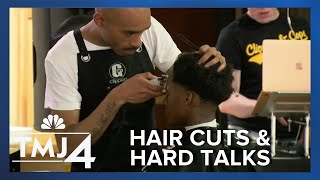 Police and community hold open forum at barber shop