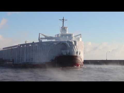 Ice-coated ship enters Duluth canal