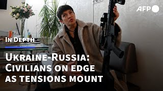 Ukraine-Russia crisis: civilians armed and families divided as tensions mount | AFP Wealth