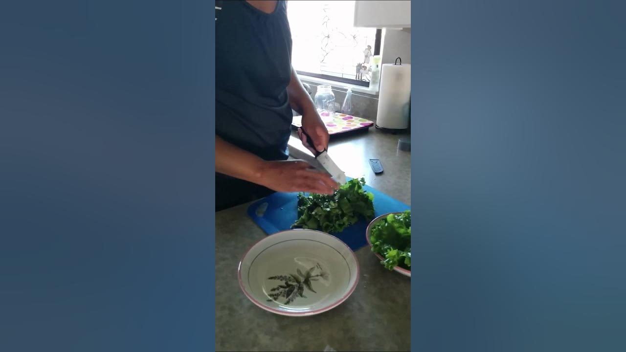 Chopping lettuce. / YouTube