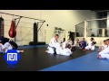 Leg lasso sweep when partner puts two knees on mat