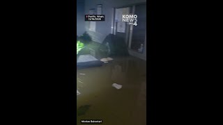 Floodwaters overtake office and semi trucks after massive storm