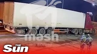 Russian police inspects truck just before it explodes on Crimea bridge