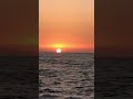 منظر غروب الشمس على شاطئ البحر