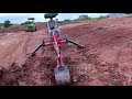 Harbor Freight Backhoe putting in a french drain.