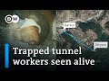 41 workers trapped in collapsed himalayan tunnel for 10 days seen alive for the first time  dw news