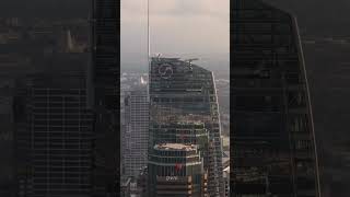 Los Angeles metropolitan cityscape showing downtown skyscrapers, tall financial towers, sprawling