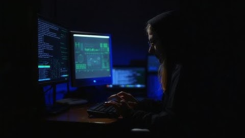 Female Hacker Using Computers Stock Video
