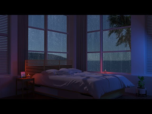 At dawn, listen to the sound of rain in a quiet resort bedroom overlooking the sea. class=