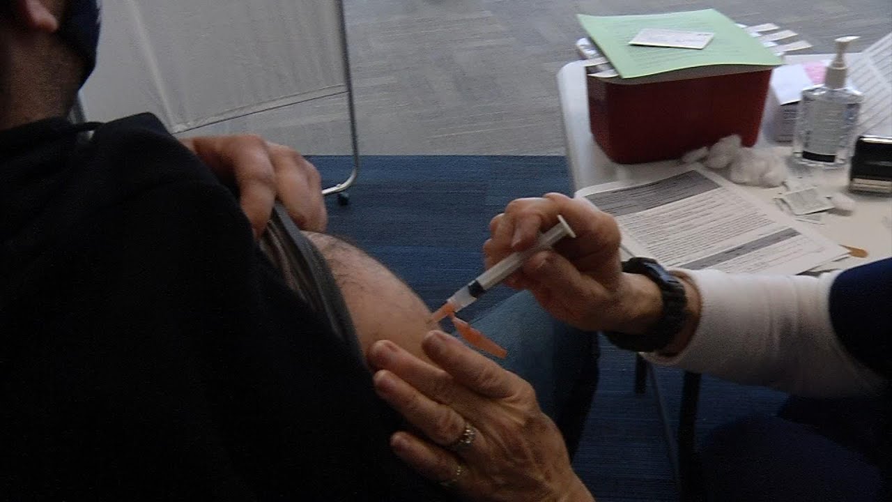 Go Behind the Scenes at the COVID-19 Vaccination Site for First ...