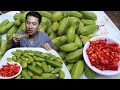  eat bilimbi fruit with salt chili