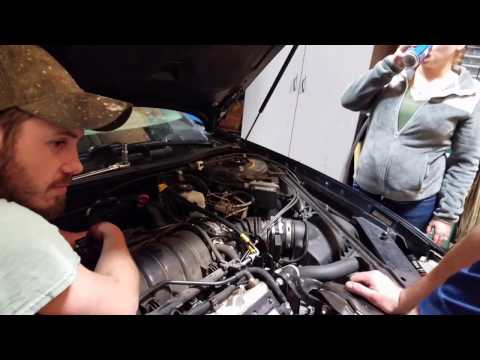 Changing spark plugs on a 2002 oldsmobile intrigue.
