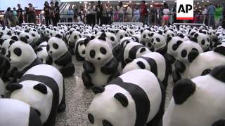 1600 hundred model pandas made from recycled paper invade airport