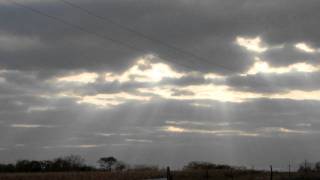 Sunbeams breaking through clouds onto cropland Plattsburg MO 3