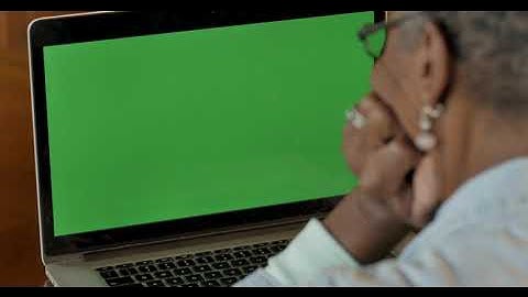 Green Screen | Chroma Key | Senior elderly black woman looking at green screen | 4K | HD