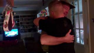 Marine home early from Afghanistan surprises Dad