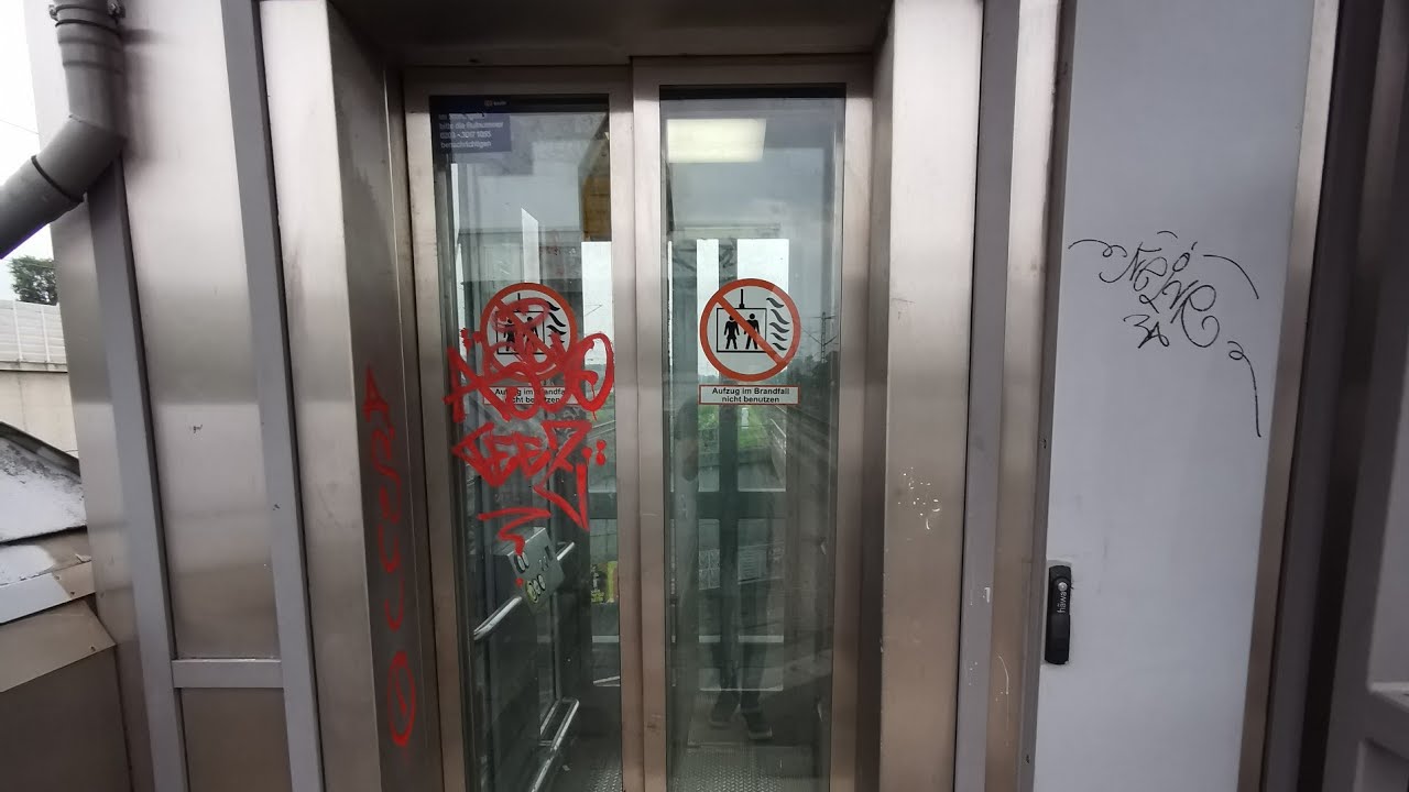 (Ansagen!) 2013 ThyssenKrupp Glasaufzug (erneuert) am S-Bahnhof Duisburg-Buchholz.