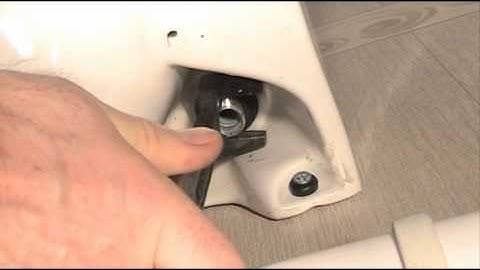 Using Basin wrench to tighten a loose tap