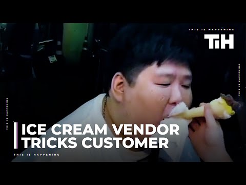 Cart Vendor Performs Tricks With Ice Cream While Serving Customer