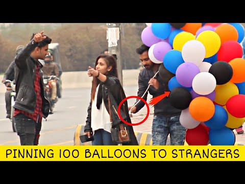 pinning-100-balloons-on-random-people-|-prank-in-pakistan