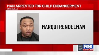 Police charge man found unresponsive in car with child