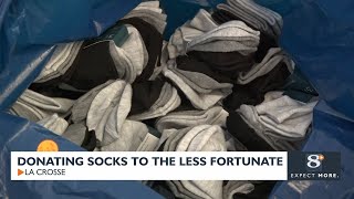La Crosse Tradehome Shoes donates 1,400 pairs of socks to area charities